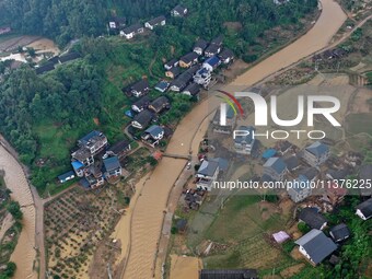 An aerial photo is showing the disaster site in Si 'an Village, Banlan town, Rongan County, Liuzhou City, South China's Guangxi Zhuang Auton...