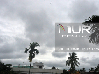 Dark rain clouds are looming over the skyline in Siliguri, India, on July 1, 2024. (