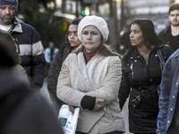 Pedestrians are facing a freezing winter morning on Avenida Paulista in Sao Paulo, on July 01, 2024. (