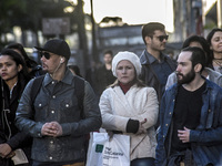 Pedestrians are facing a freezing winter morning on Avenida Paulista in Sao Paulo, on July 01, 2024. (