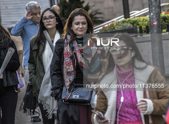 Pedestrians are facing a freezing winter morning on Avenida Paulista in Sao Paulo, on July 01, 2024. 