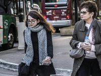 Pedestrians are facing a freezing winter morning on Avenida Paulista in Sao Paulo, on July 01, 2024. (