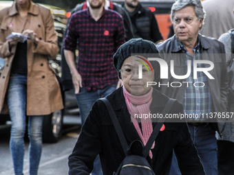 Pedestrians are facing a freezing winter morning on Avenida Paulista in Sao Paulo, on July 01, 2024. (