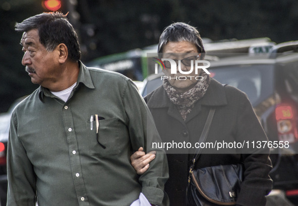 Pedestrians are facing a freezing winter morning on Avenida Paulista in Sao Paulo, on July 01, 2024. 