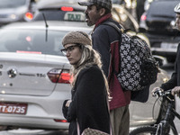 Pedestrians are facing a freezing winter morning on Avenida Paulista in Sao Paulo, on July 01, 2024. (