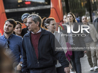 Pedestrians are facing a freezing winter morning on Avenida Paulista in Sao Paulo, on July 01, 2024. (