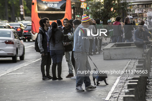 Pedestrians are facing a freezing winter morning on Avenida Paulista in Sao Paulo, on July 01, 2024. 