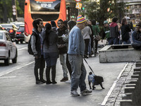 Pedestrians are facing a freezing winter morning on Avenida Paulista in Sao Paulo, on July 01, 2024. (