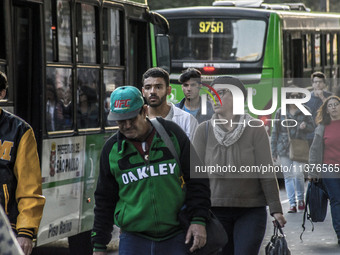 Pedestrians are facing a freezing winter morning on Avenida Paulista in Sao Paulo, on July 01, 2024. (