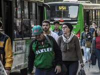 Pedestrians are facing a freezing winter morning on Avenida Paulista in Sao Paulo, on July 01, 2024. (