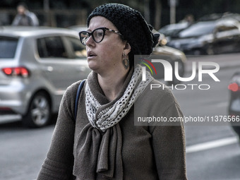 Pedestrians are facing a freezing winter morning on Avenida Paulista in Sao Paulo, on July 01, 2024. (