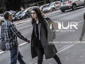 Pedestrians are facing a freezing winter morning on Avenida Paulista in Sao Paulo, on July 01, 2024. (