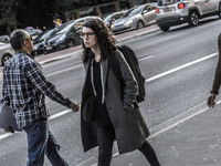 Pedestrians are facing a freezing winter morning on Avenida Paulista in Sao Paulo, on July 01, 2024. (