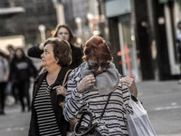 Pedestrians are facing a freezing winter morning on Avenida Paulista in Sao Paulo, on July 01, 2024. (