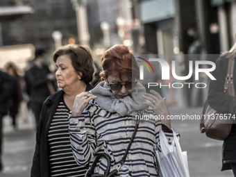 Pedestrians are facing a freezing winter morning on Avenida Paulista in Sao Paulo, on July 01, 2024. (