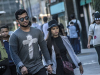 Pedestrians are facing a freezing winter morning on Avenida Paulista in Sao Paulo, on July 01, 2024. (