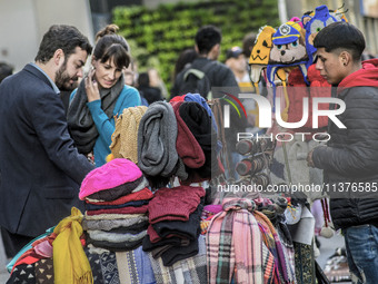 Pedestrians are facing a freezing winter morning on Avenida Paulista in Sao Paulo, on July 01, 2024. (