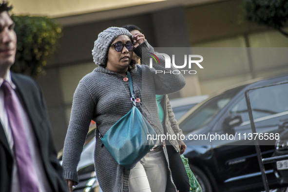 Pedestrians are facing a freezing winter morning on Avenida Paulista in Sao Paulo, on July 01, 2024. 