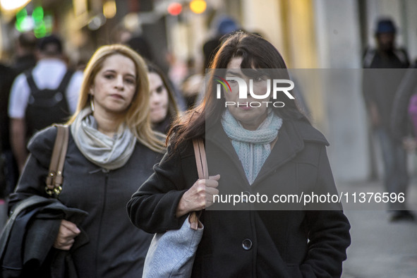 Pedestrians are facing a freezing winter morning on Avenida Paulista in Sao Paulo, on July 01, 2024. 