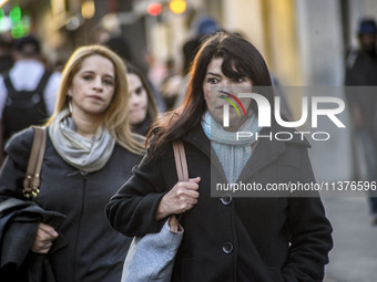 Pedestrians are facing a freezing winter morning on Avenida Paulista in Sao Paulo, on July 01, 2024. (