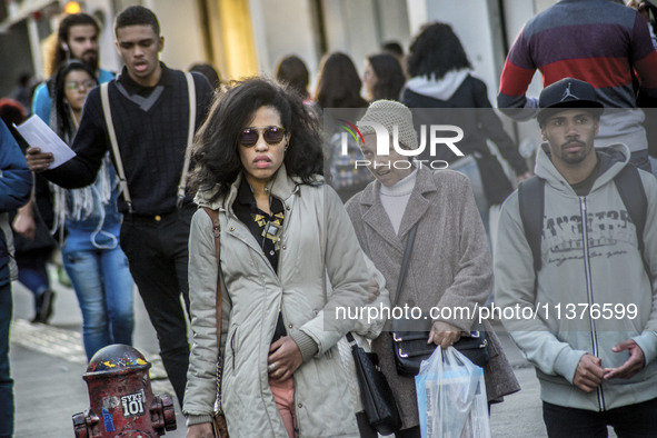 Pedestrians are facing a freezing winter morning on Avenida Paulista in Sao Paulo, on July 01, 2024. 