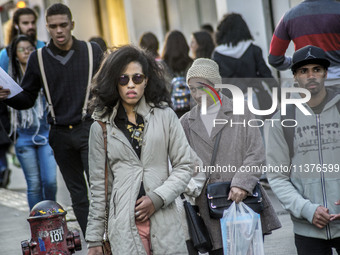 Pedestrians are facing a freezing winter morning on Avenida Paulista in Sao Paulo, on July 01, 2024. (