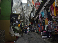 Narrow lanes consisting of essential item shops are being seen during rainfall in Darjeeling, India, on July 1, 2024. Darjeeling is a famous...