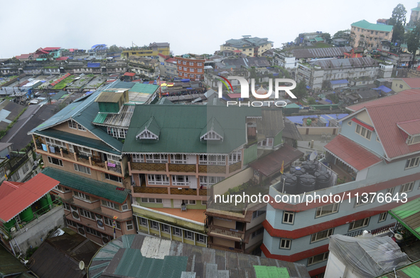 Houses and commercial hotels are being seen during rainfall in Darjeeling, India, on July 1, 2024. Darjeeling is a famous tourist destinatio...