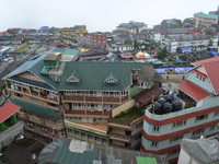 Houses and commercial hotels are being seen during rainfall in Darjeeling, India, on July 1, 2024. Darjeeling is a famous tourist destinatio...