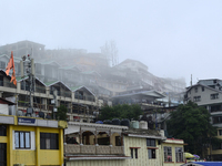 Houses and commercial hotels are being seen during rainfall in Darjeeling, India, on July 1, 2024. Darjeeling is a famous tourist destinatio...