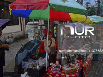 Roadside food stalls are being seen during heavy rainfall in Darjeeling, India, on July 1, 2024. Darjeeling is a famous tourist destination...