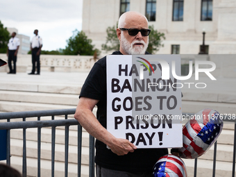 Trump opponent Bill Christeson, a DC-area resident, demonstrates at the U. S. Supreme Court as it issues the last remaining opinions of the...