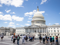 Tourists visit the U.S. Capitol as the Supreme Court issues the last remaining opinions of the term, including a decision on Donald Trump's...