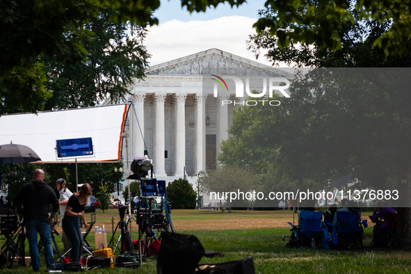 News outlets stage in front of the U. S. Supreme Court as it issues the last remaining opinions of the term, including a decision on Donald...