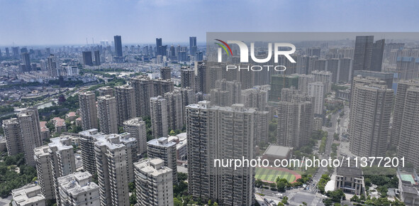 A photo is showing residential buildings in Huai'an, China, on July 1, 2024. 