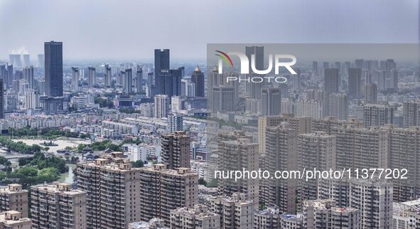 A photo is showing residential buildings in Huai'an, China, on July 1, 2024. 