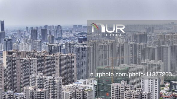 A photo is showing residential buildings in Huai'an, China, on July 1, 2024. 