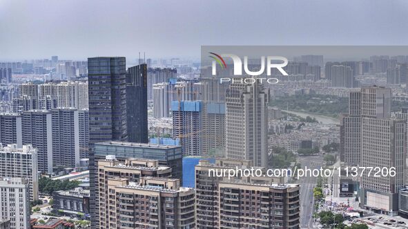 A photo is showing residential buildings in Huai'an, China, on July 1, 2024. 