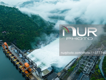 Flood discharge is happening from the Xin 'an River Dam in Hangzhou, China, on June 26, 2024. (