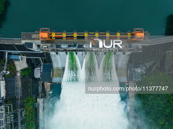 Flood discharge is happening from the Xin 'an River Dam in Hangzhou, China, on June 26, 2024. 