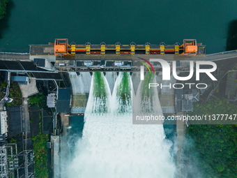 Flood discharge is happening from the Xin 'an River Dam in Hangzhou, China, on June 26, 2024. (