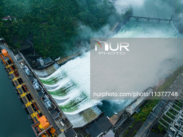 Flood discharge is happening from the Xin 'an River Dam in Hangzhou, China, on June 26, 2024. 