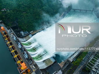 Flood discharge is happening from the Xin 'an River Dam in Hangzhou, China, on June 26, 2024. (