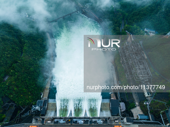 Flood discharge is happening from the Xin 'an River Dam in Hangzhou, China, on June 26, 2024. 