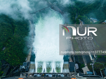 Flood discharge is happening from the Xin 'an River Dam in Hangzhou, China, on June 26, 2024. (