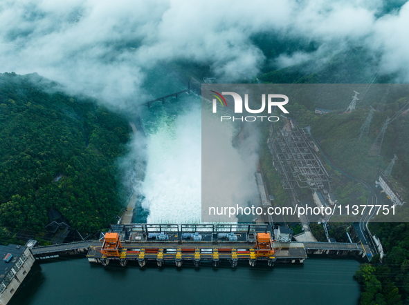 Flood discharge is happening from the Xin 'an River Dam in Hangzhou, China, on June 26, 2024. 