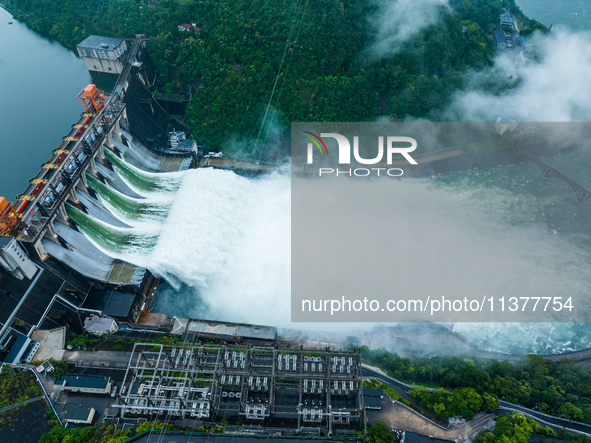 Flood discharge is happening from the Xin 'an River Dam in Hangzhou, China, on June 26, 2024. 