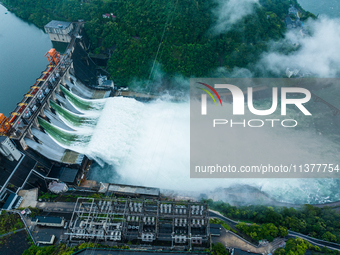 Flood discharge is happening from the Xin 'an River Dam in Hangzhou, China, on June 26, 2024. (