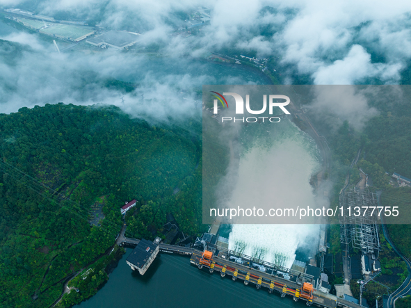 Flood discharge is happening from the Xin 'an River Dam in Hangzhou, China, on June 26, 2024. 