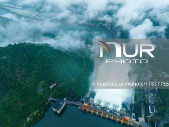 Flood discharge is happening from the Xin 'an River Dam in Hangzhou, China, on June 26, 2024. (